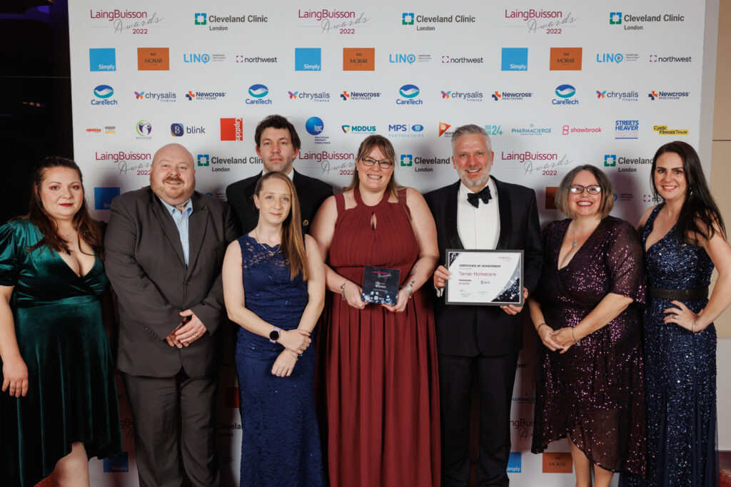 The Tamar team standing with their award.
